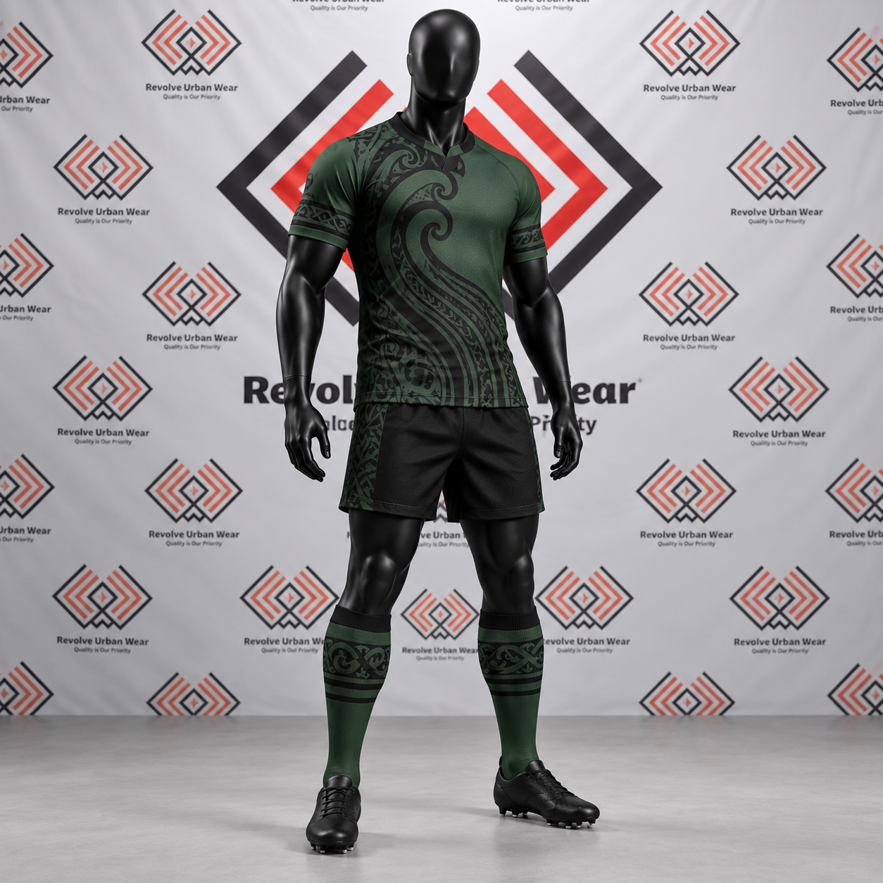 Green and black custom rugby union uniform with Māori tribal patterns on a mannequin.
