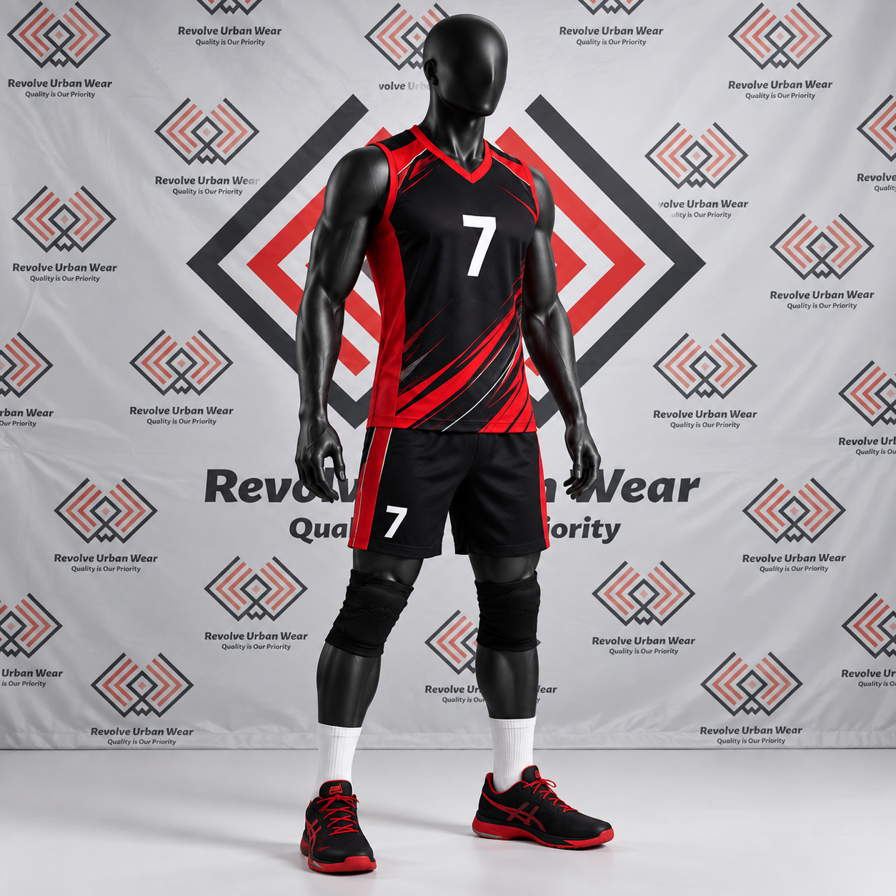 Custom black and red volleyball uniform with diagonal accents on a mannequin.