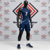 Custom navy blue and white volleyball uniform with diagonal accents on a mannequin.