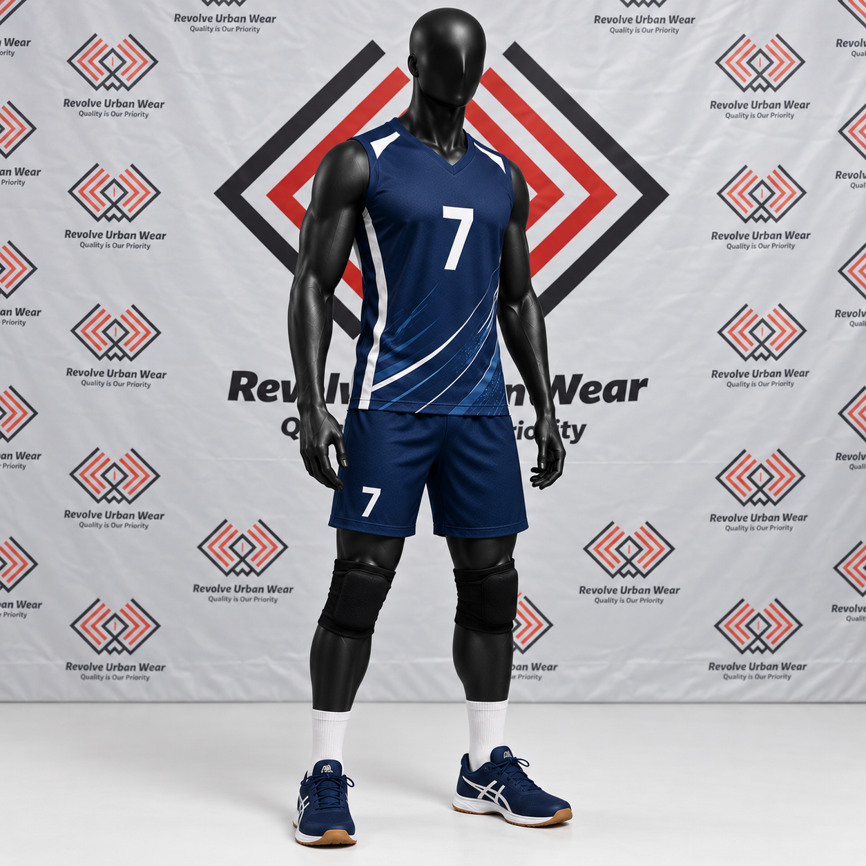 Custom navy blue and white volleyball uniform with diagonal accents on a mannequin.