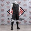 Custom black 7v7 hood set featuring a sleeveless hooded jersey, matching shorts, and tonal Māori tribal patterns on a white mannequin.