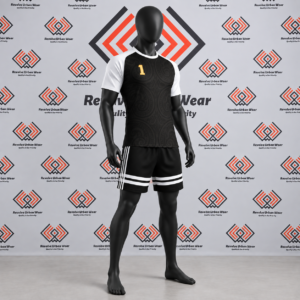 Custom black rugby league uniform featuring tonal Māori torso patterns, white raglan sleeves, and striped black shorts on a mannequin.