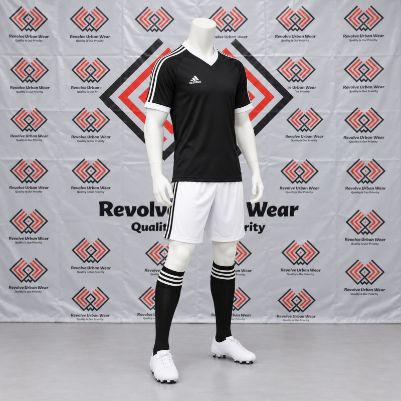 Black White Soccer Kit featuring a made to order black V-neck jersey with white shoulder stripes, white shorts, and black socks.