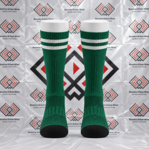 Custom green and white crew socks featuring ribbed cuffs and black reinforced toe panels on leg mannequins.