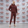 Custom burgundy hooded fleece tracksuit featuring a pullover hoodie and tapered jogger sweatpants on a mannequin.