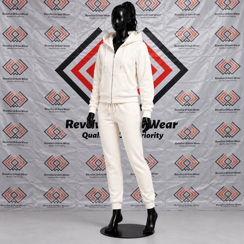 Custom cream hooded fleece tracksuit featuring a full-zip hoodie and tapered jogger sweatpants on a black mannequin