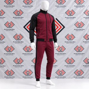 Custom maroon and black tracksuit featuring a full-zip raglan jacket and tapered jogger pants on a white mannequin.